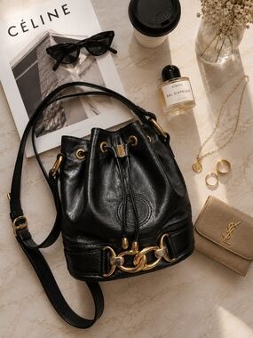 Luxury Black Leather Drawstring Bucket Bag with Gold Hardware